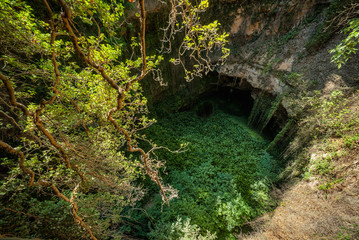 Deep natural sink hole in Grisel, Aragon, Spain .