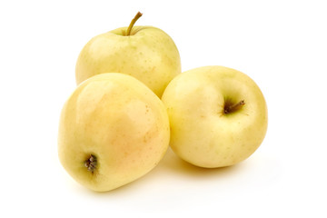 Golden delicious apples, isolated on white background