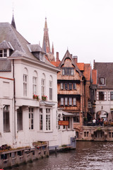 Fototapeta na wymiar Typical buildings near the river in the city of Bruges,Belgium.
