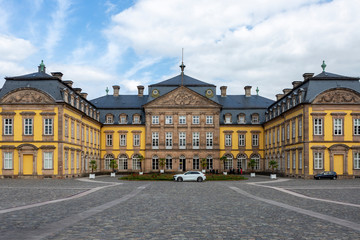 Architecture of the yellow classic style Arolsen castle in Bad Arolsen in the Sauerland region