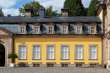 Architecture of the yellow classic style Arolsen castle in Bad Arolsen in the Sauerland region