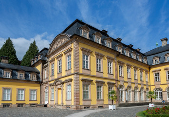 Fototapeta na wymiar Architecture of the yellow classic style Arolsen castle in Bad Arolsen in the Sauerland region