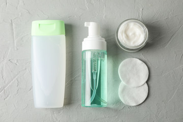 Flat lay with body care accessories on grey background, space for text