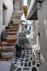 Cushions on steps in a side street in old Naxos town, Greek Islands