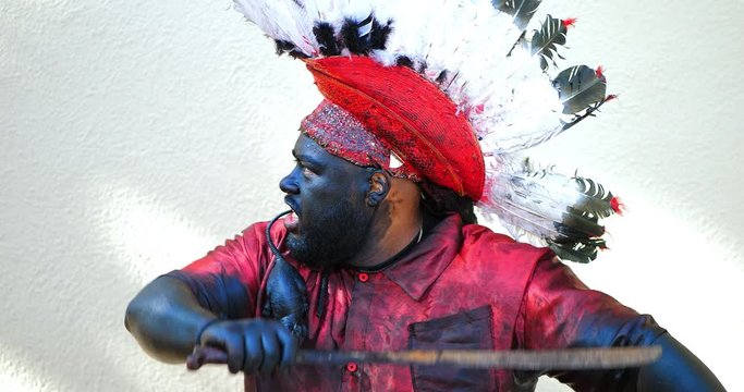 Scary Native American apache  with machete fighting, 4K