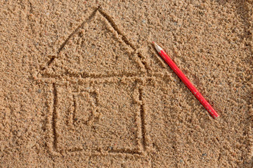 simple drawing of a house on the sand