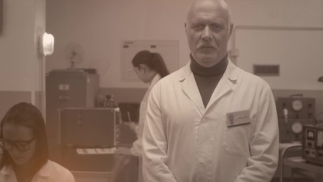 Scientist standing in the laboratory and giving a speech
