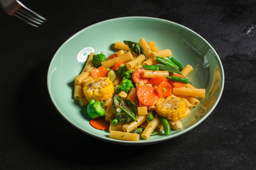 pasta vegetables (tasty and healthy salad, Italian cuisine) menu concept. food background. copy space. Top view