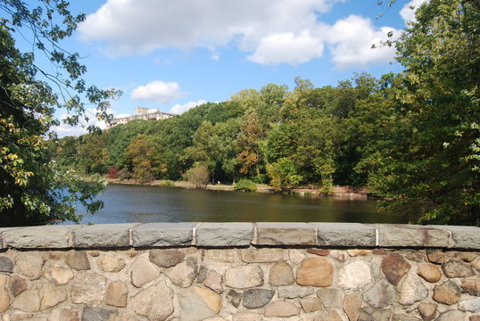 Rock ledge with lake and trees as a background for a beautiful setiing
