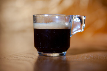 glass of beer on black background