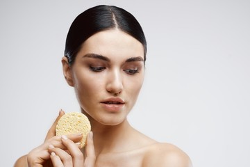 portrait of young woman with perfect skin of face