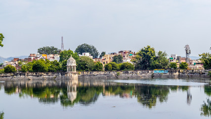Fototapeta na wymiar Reflections on Udaipur's lake
