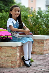 Diverse Child Girl Student And Happiness With Notebooks