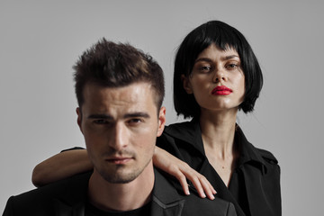 portrait of young man and woman