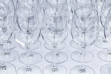 Arrangement of Wine Glasses on White Linen Background