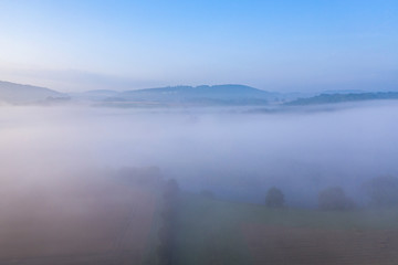 Drone Shoot over Foggy Summer Fields