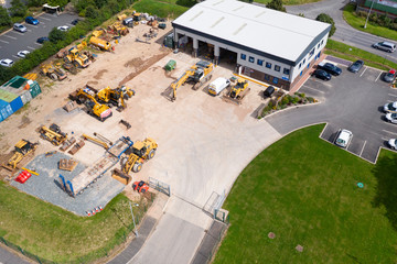 Aerial View over Construction Machinery Yard