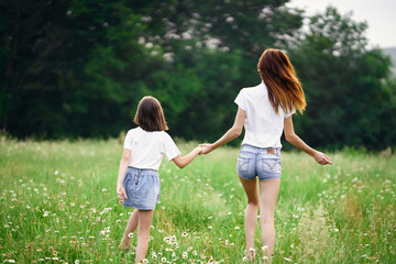 Fototapeta premium mother and daughter in the park