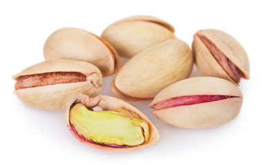 Raw pistachio on white background