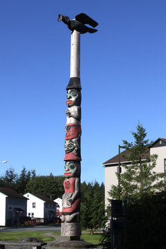 A Raven totem pole carved by Alaskan natives 