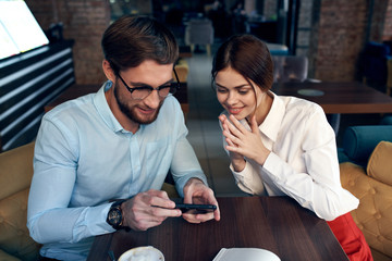 young couple having dinner in restaurant