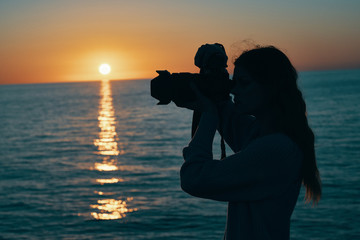 couple kissing at sunset