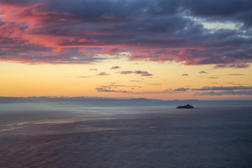 Red sunset over The Bay of Plenty from Mount Maunganui, New Zealand