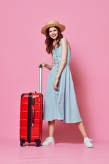 young woman with suitcase