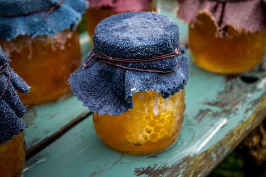 Fresh honey in a vintage glass jar in New Zealand