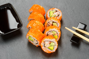 Sushi rolls and soy sauce