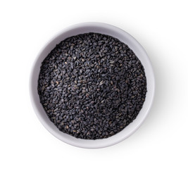 sesame in a bowl isolated on white background. top view