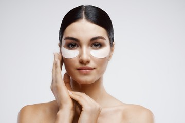 Beautiful woman patches on her face