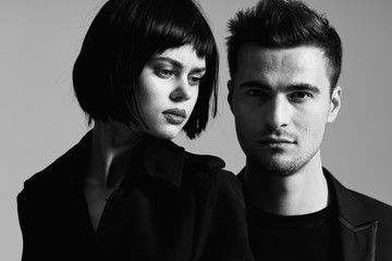 portrait of young man and woman