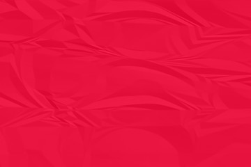 crumpled red paper background close up