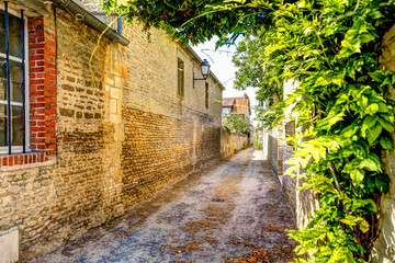 Fototapeta na wymiar Rustic lane way in a small village in northern France