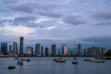 Fototapeta premium Beautiful morning over Hudson river, featuring New Jersey skyline on the background and boats on the foreground