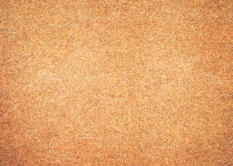 Fototapeta na wymiar Close up of cork board texture wall background for memo card, note pad or creative design.