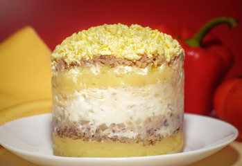 Themed holiday salad Mimosa with Cheese Mouse in honor of the 2020 new year on the Chinese calendar. Eastern horoscope. Traditional Russian holiday food - Mimoza. Selective focus.