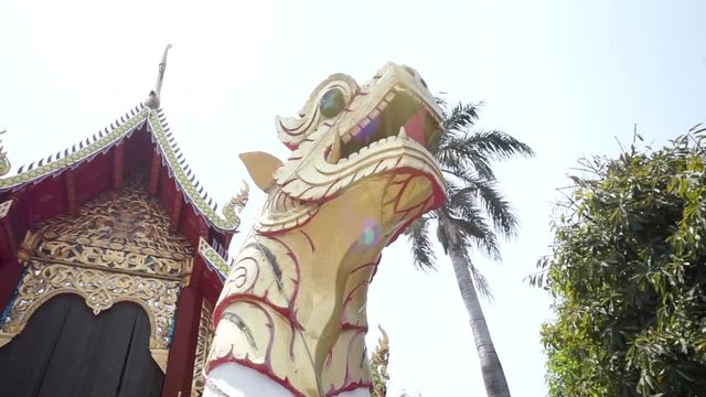 Dragon statue outside a temple in Asia. 
Concept: Tourist attraction, Travel/Holiday, Culture, Famous location.