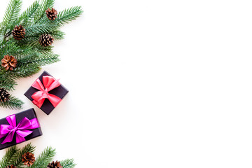 Boxes with presents and fir tree frame for christmas on white background top veiw mock-up