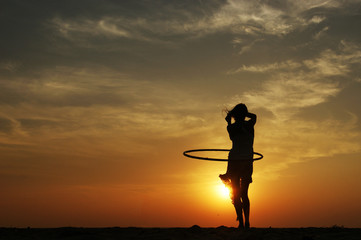 silhouette of a dancing woman