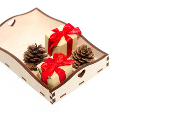 New Year. Decoration for the Christmas tree in a wooden tray.
