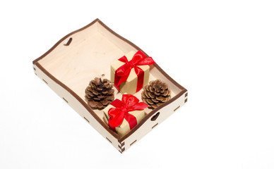 New Year. Decoration for the Christmas tree in a wooden tray.