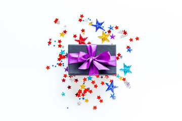 present in box with confetti on white background top view