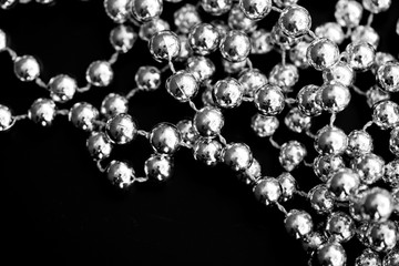 Christmas decoration on a dark surface close up black and white. Abstract background
