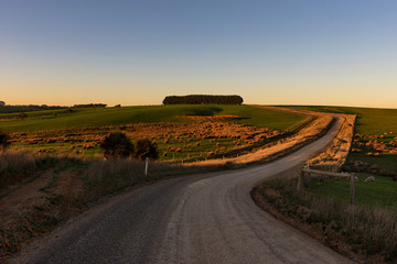 Fototapeta na wymiar off road in the countryside with field and hay bales, Australia 2019