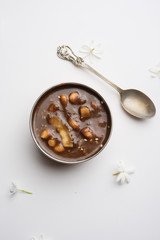 ambrosia or Panchamrit or Panchamrut or Panchamrutham or Panchamrutha is a sweet and sour food offered in prayers or puja to hindu Deity or gods