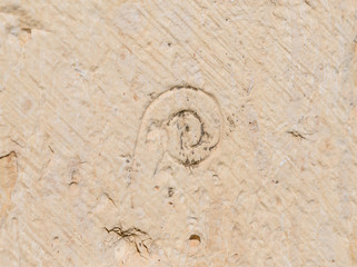 The well-preserved sign on the stone of the Builders Guild from the time of the Second Temple on the wall near the Jaffa Gate in the Old City in Jerusalem, Israel