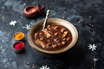 ambrosia or Panchamrit or Panchamrut or Panchamrutham or Panchamrutha is a sweet and sour food offered in prayers or puja to hindu Deity or gods