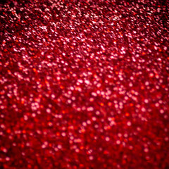 Red and black glitter vintage lights background  for Valentines Day and Christmas greeting Card.  Defocused abstract red sparkles